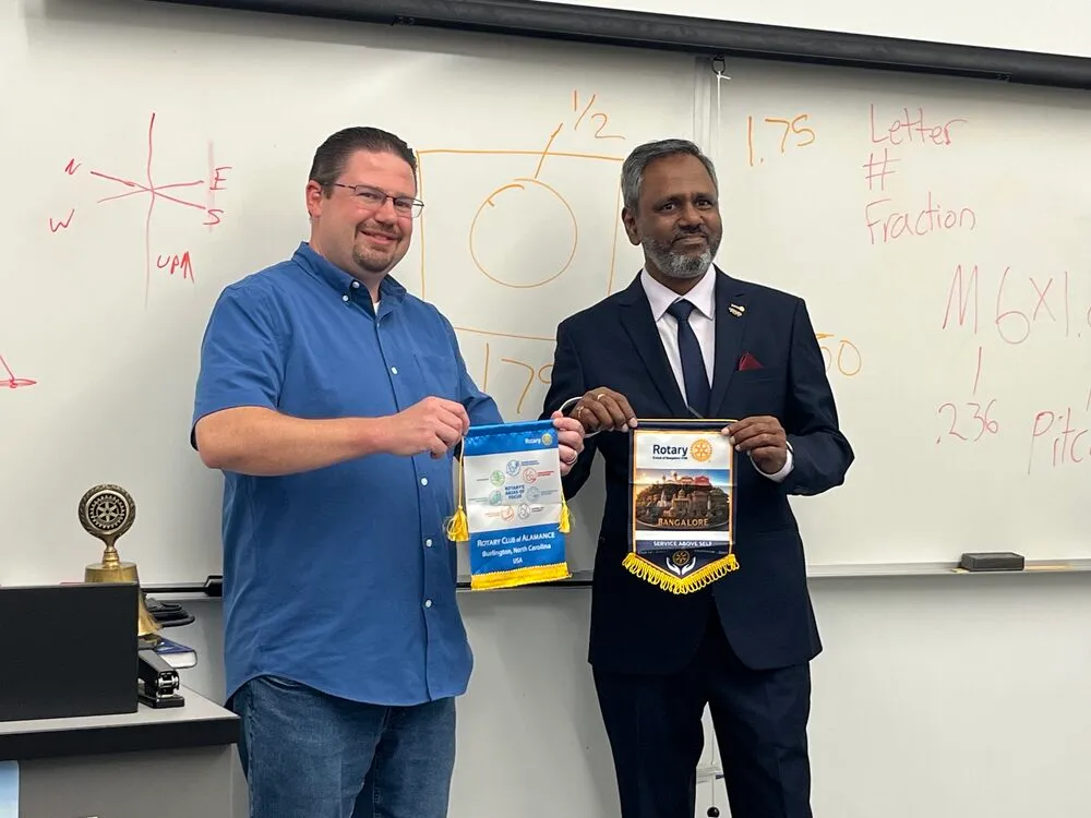Flag exchange with the Rotary Club of Alamance