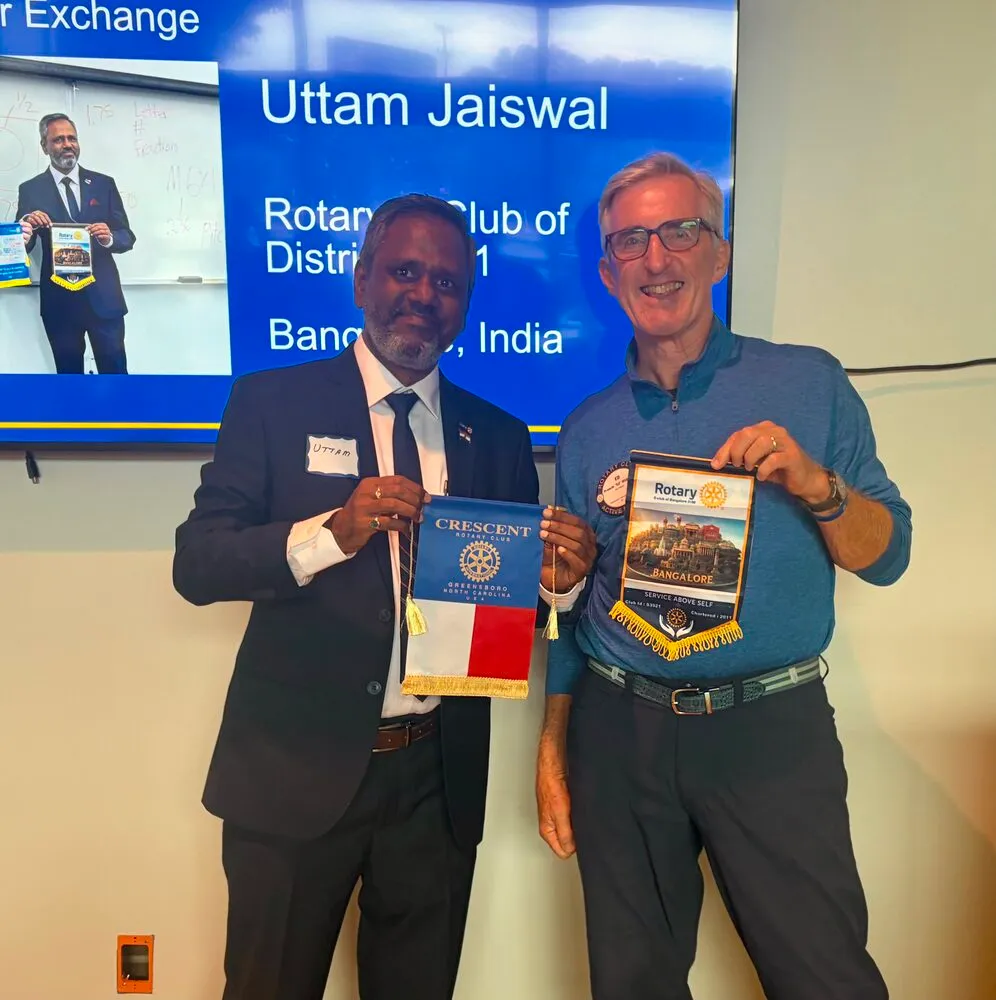 Flag exchange with the Crescent Rotary Club