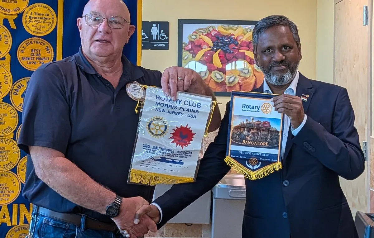 Flag exchange with the Rotary Club of Morris Plains