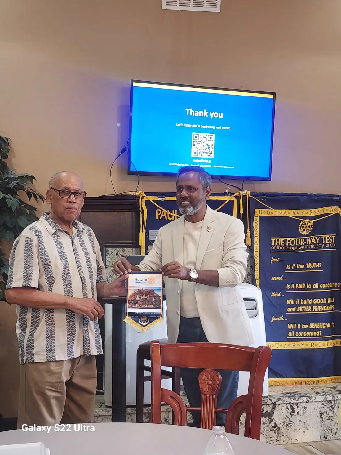 Flag exchange with the Rotary Club of Southern Guilford